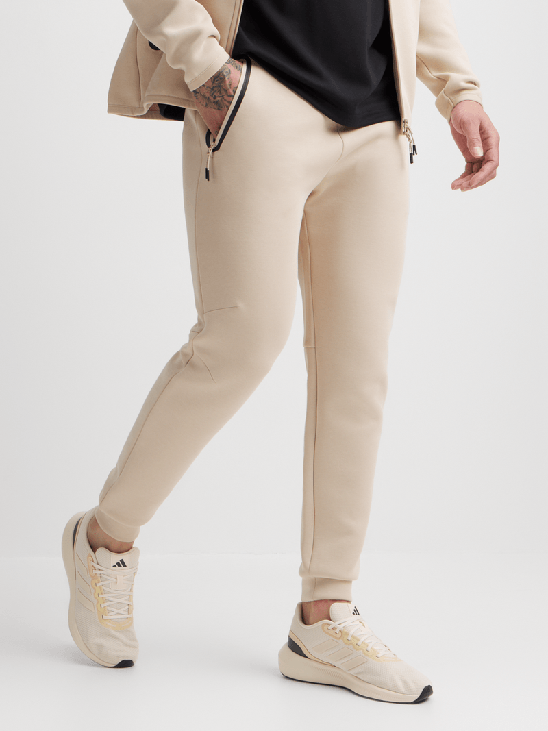Men&#39;s Studio-Tech Stone Joggers: Stylish, Comfortable, Versatile with Side Poppers